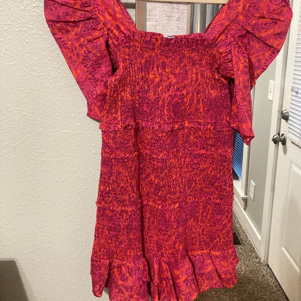 Olivaceous brand pink and orange printed ruched mini dress with ruffle trim hem